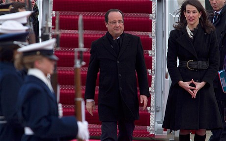 french President Francois Hollande was greeted by US Deputy Chief of Protocol Natalie Jones